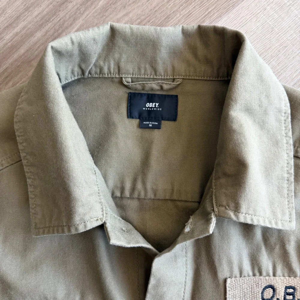 Obey Worldwide Mens Khaki Tan Military Chore Jacket Shirt O.B.E.Y. Patch Medium